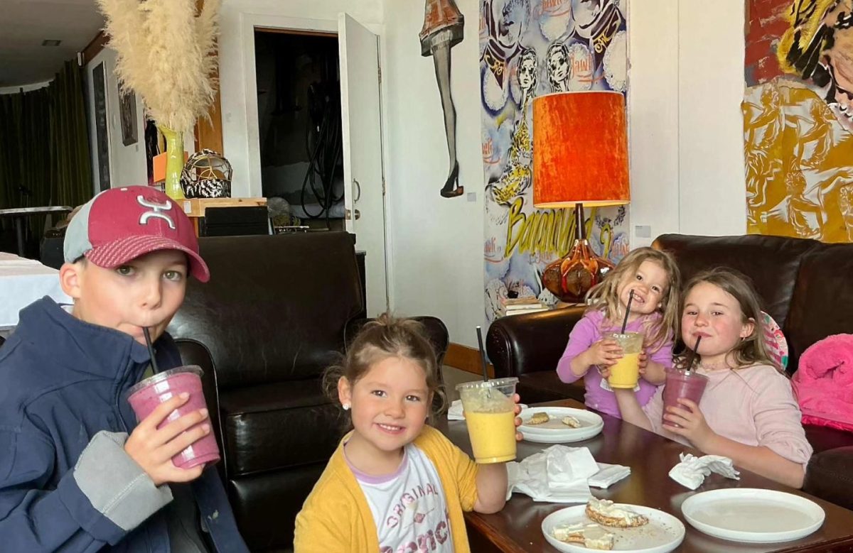 Kids enjoying smoothies and bagels at Stone's Throw Café