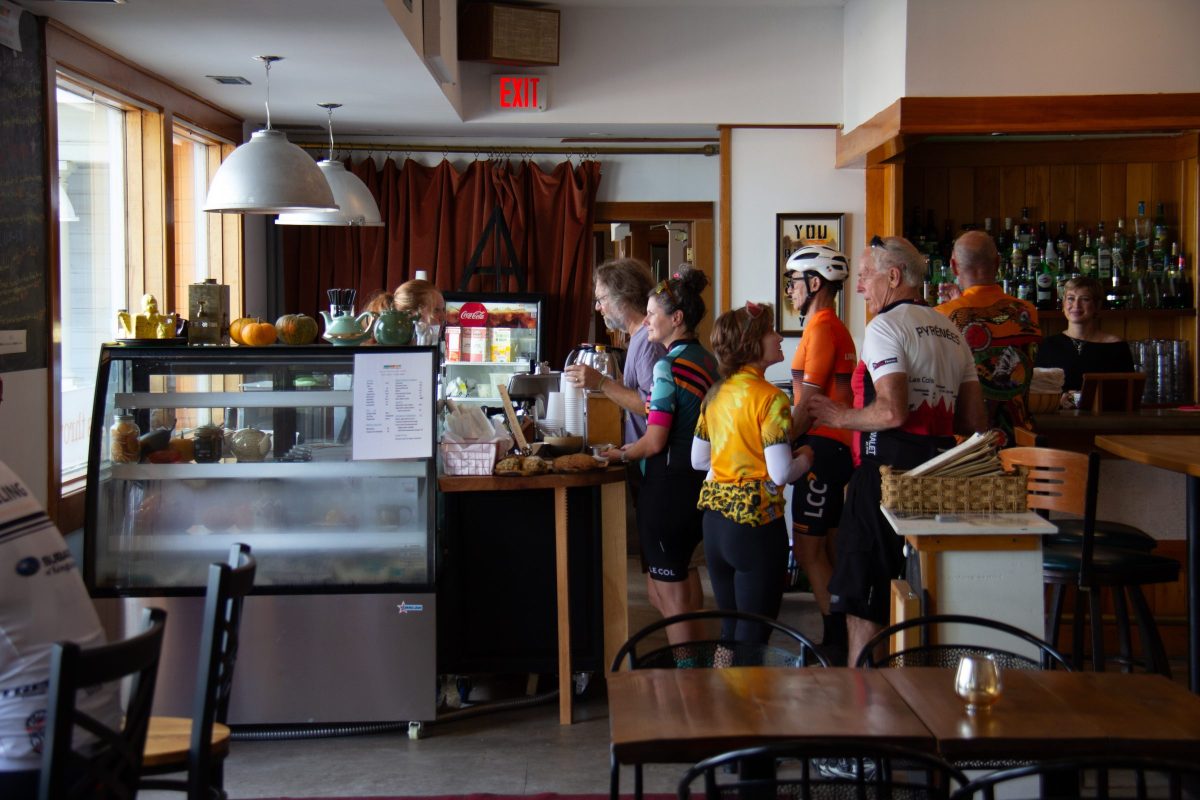 Cyclists Inside the Café